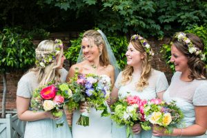 Colourful Shustoke Farm Barn Wedding with a Vintage Red Bus